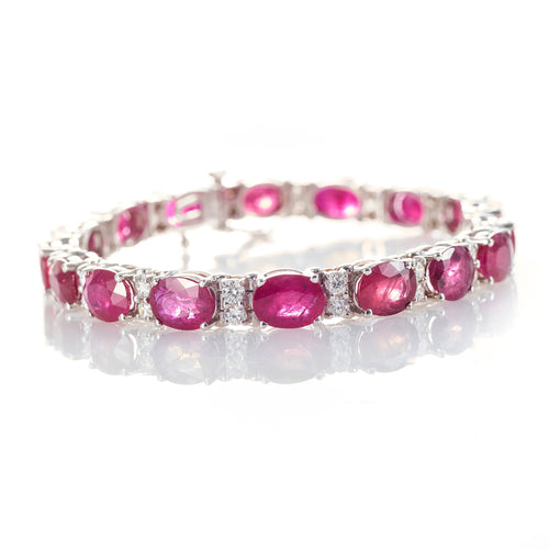 Ruby Oval and Diamond Tennis Bracelet in White Gold