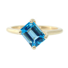 Load image into Gallery viewer, Emerald Cut Estate Blue Topaz Ring in 14k Yellow Gold
