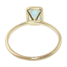Load image into Gallery viewer, Emerald Cut Blue Topaz Ring in 14k Yellow Gold
