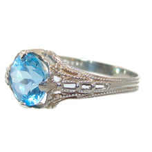 Load image into Gallery viewer, Round Cut Blue Topaz Ring in 10k White Gold
