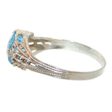 Load image into Gallery viewer, Round Cut Blue Topaz Ring in 10k White Gold
