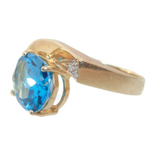 Load image into Gallery viewer, Oval Cut Blue Topaz Ring in 14k Yellow Gold Diamond Accent Free Form
