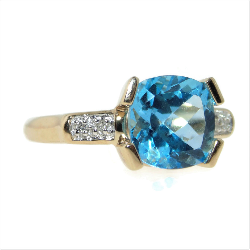 3.0 carat Blue Topaz Statement Ring in 14k Yellow Gold with Diamonds