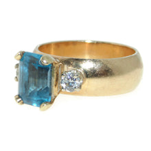 Load image into Gallery viewer, Estate Blue Emerald Cut Topaz Ring in 14k Yellow Gold with Diamonds
