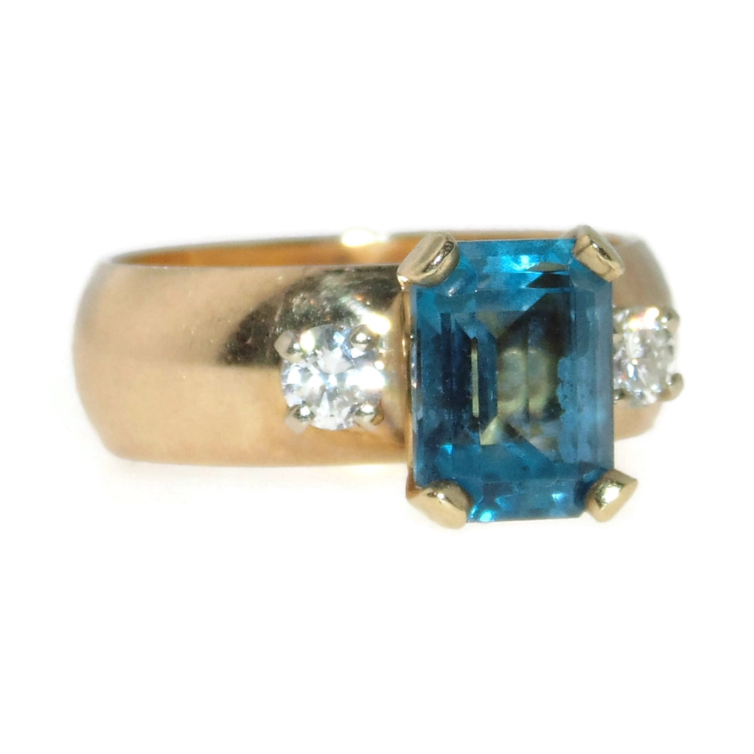 Estate Blue Emerald Cut Topaz Ring in 14k Yellow Gold with Diamonds