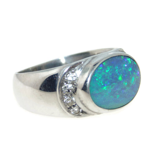 Bezel Set Peridot Ring with Hidden Diamonds