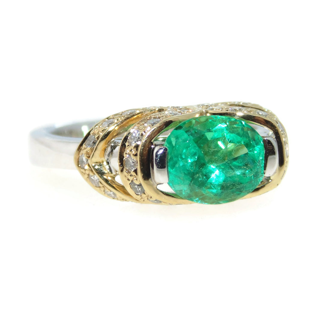 Yellow and White Gold Oval Emerald Diamond Ring