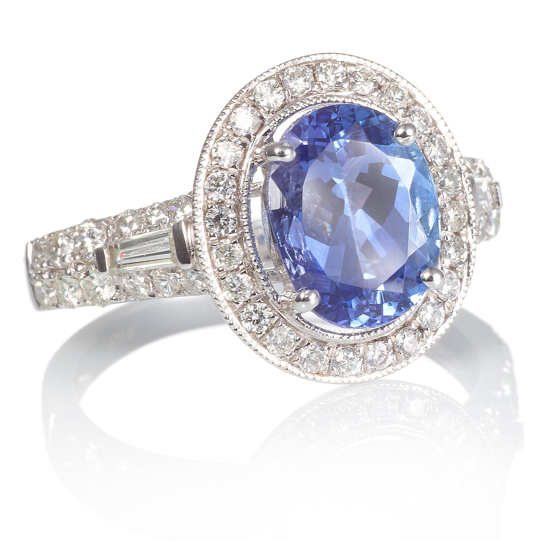 Oval Tanzanite and Diamond Halo Ring in 14k White Gold