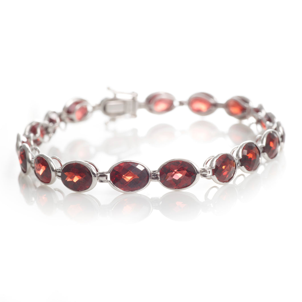Oval Garnet Tennis Bracelet in 14k White Gold
