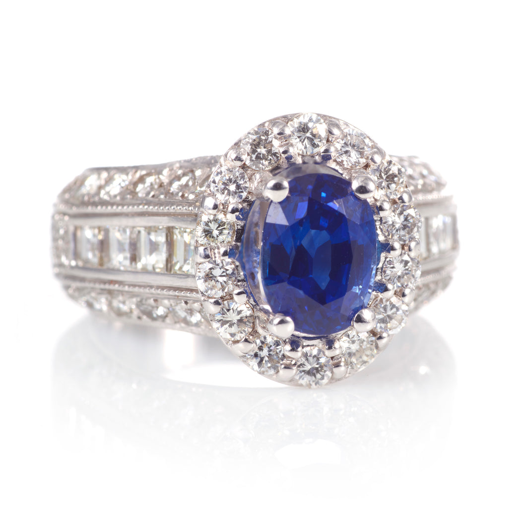 Oval Sapphire and Diamond Halo Ring in 14k White Gold