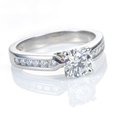 Diamond with Channel Band Ring in Platinum